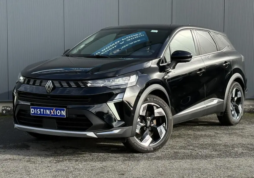 Renault Symbioz E-Tech noir étoilé, vue 3/4 avant droit, jantes 18 pouces Gravity et calandre moderne.