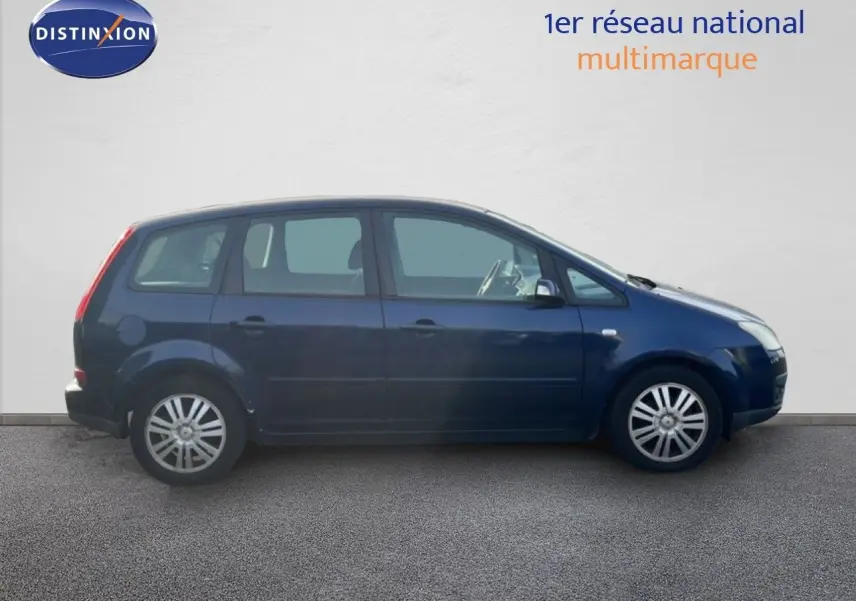 Vue de profil côté gauche d'une Ford C-MAX 2005 bleu foncé métallisé avec cinq portes et jantes alliage.