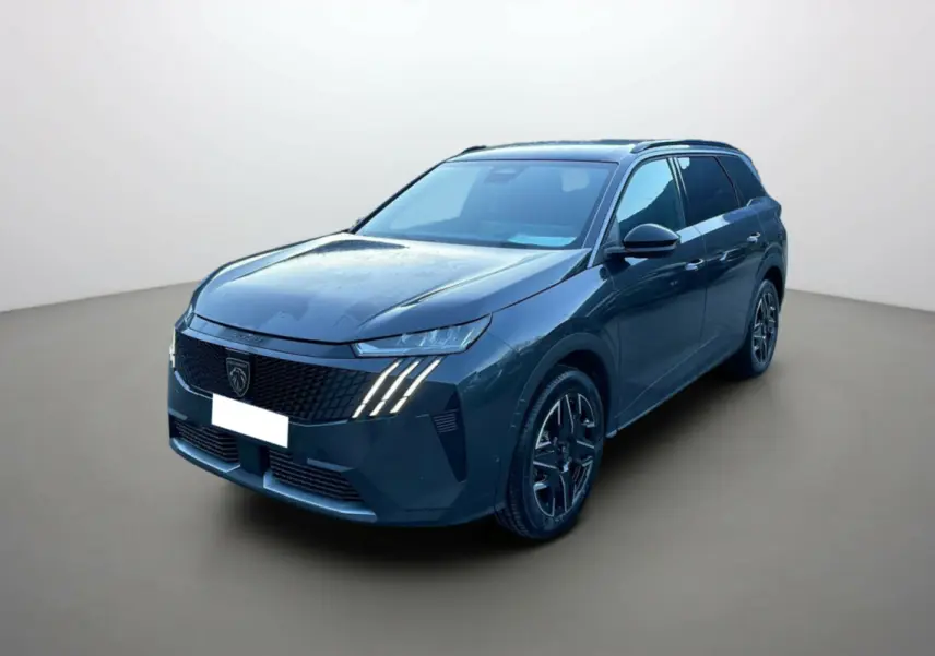 Peugeot 5008 Hybrid 145 gris titane en 3/4 avant droit, avec feux LED distinctifs et jantes alu 19 pouces.