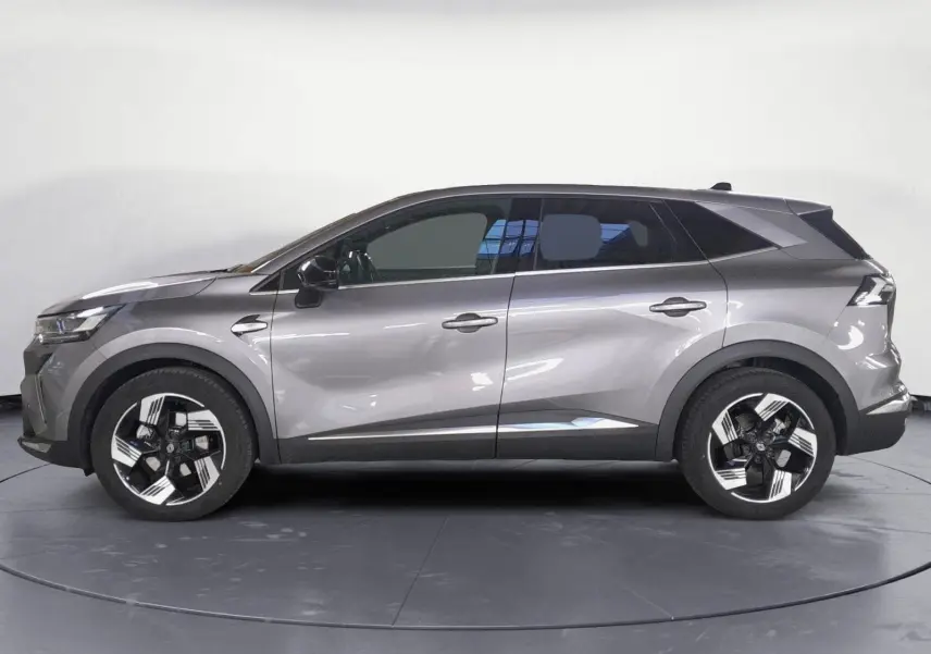 Profil droit du Renault Symbioz gris Casiopee, avec jantes alliage 18'' diamantées et vitres surteintées.