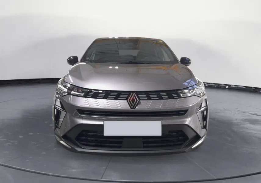 Renault Symbioz E-Tech Full Hybrid gris Casiopee vu de face, avec calandre moderne et phares LED fins.