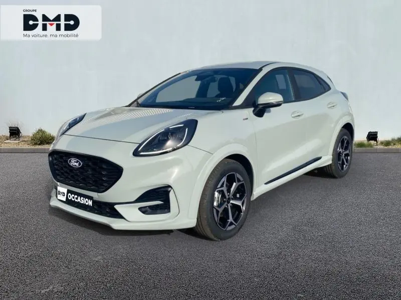 Ford Puma 1.0 EcoBoost Hybrid gris Cactus, vue 3/4 avant avec jantes alliage noires et phares LED.