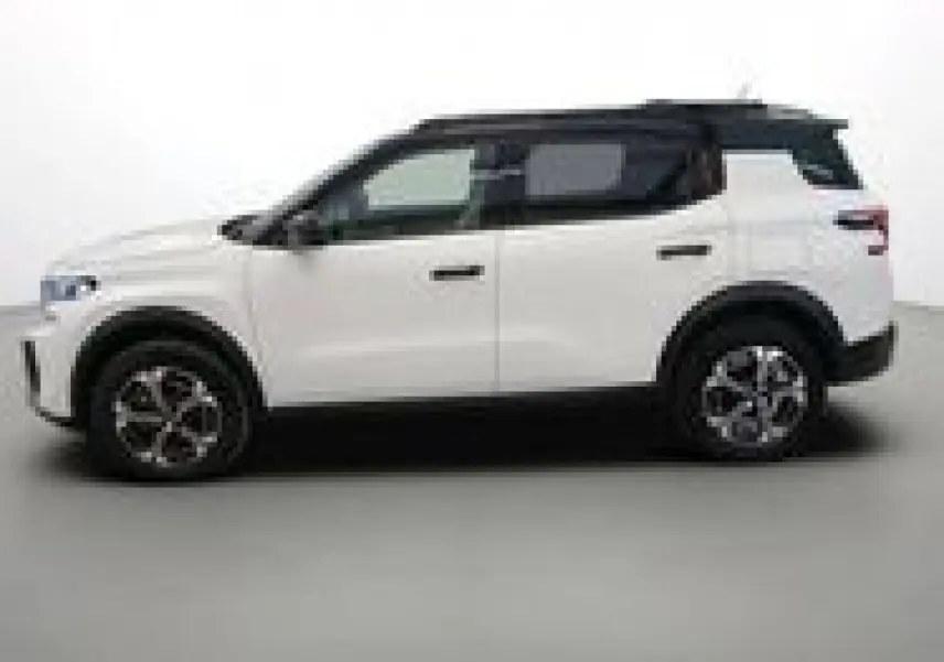 Profil droit du Citroën C3 Aircross blanc banquise avec toit noir, roues alliage et lignes compactes modernes.