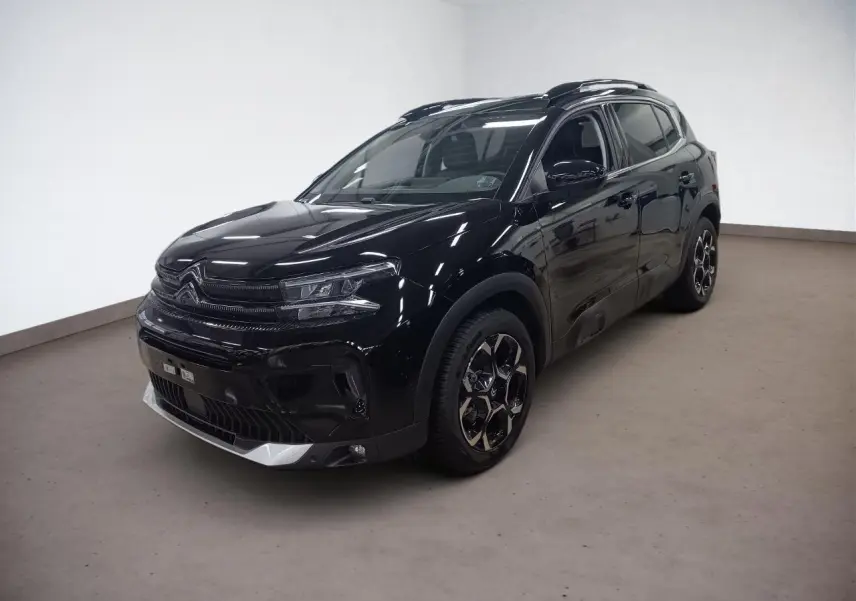 Citroën C5 Aircross Hybrid noir Perla en 3/4 avant droit avec jantes diamantées et barres de toit noires.