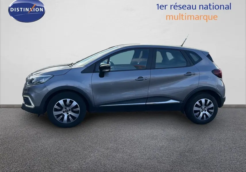 Renault Captur Zen gris cassiopée en profil côté gauche, avec jantes alliage et lignes de carrosserie fluides.