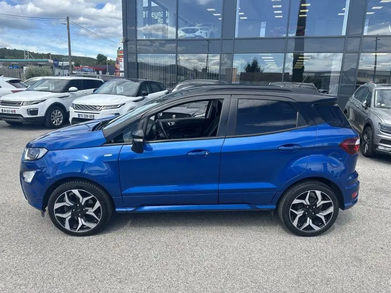 Ford EcoSport 1.0 Ecoboost 125 CV ST Line bleu métal, vue de profil côté gauche avec jantes alliage distinctives.