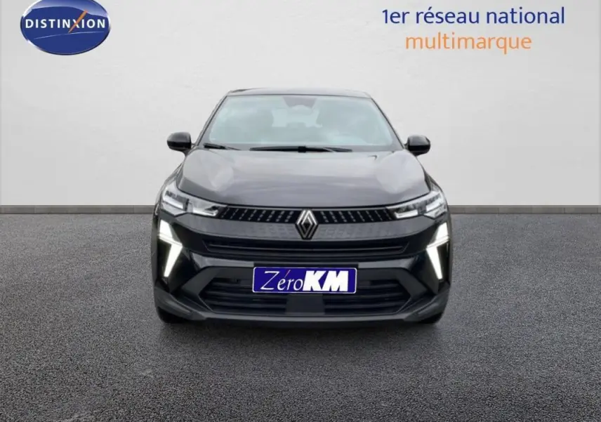 Vue frontale d'un Renault Captur noir 2025 avec feux diurnes LED allumés sur fond neutre.