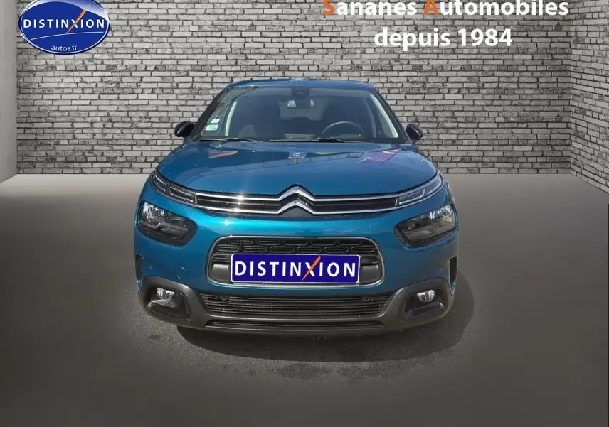 Vue avant d'une Citroën C4 Cactus 2020 bleu métal avec calandre distinctive et phares séparés.