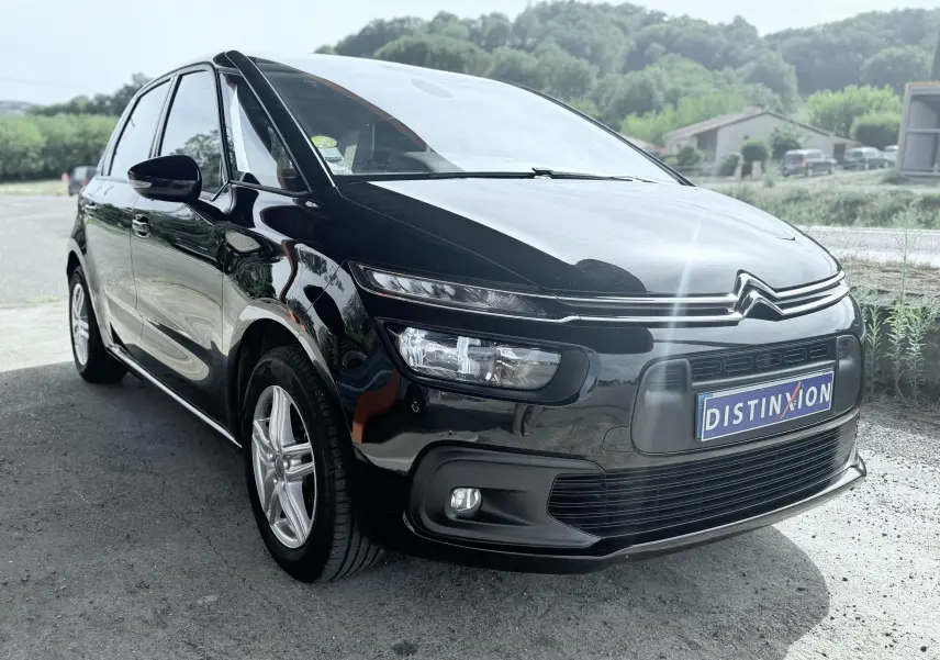 Citroën C4 Spacetourer noir vue 3/4 avant droit, avec calandre distinctive et jantes alliage argentées.
