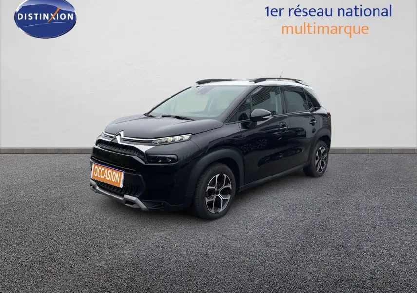 SUV Citroën C3 Aircross noir perle métal en 3/4 avant droit avec jantes bi-ton et toit noir.