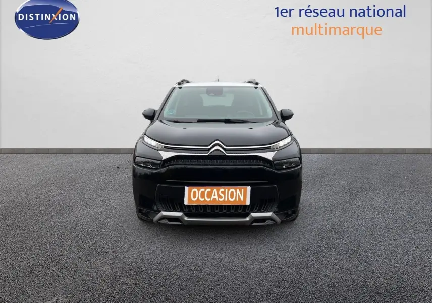 Vue frontale d'un Citroën C3 Aircross noir perle métal avec plaque "OCCASION" sur fond neutre.