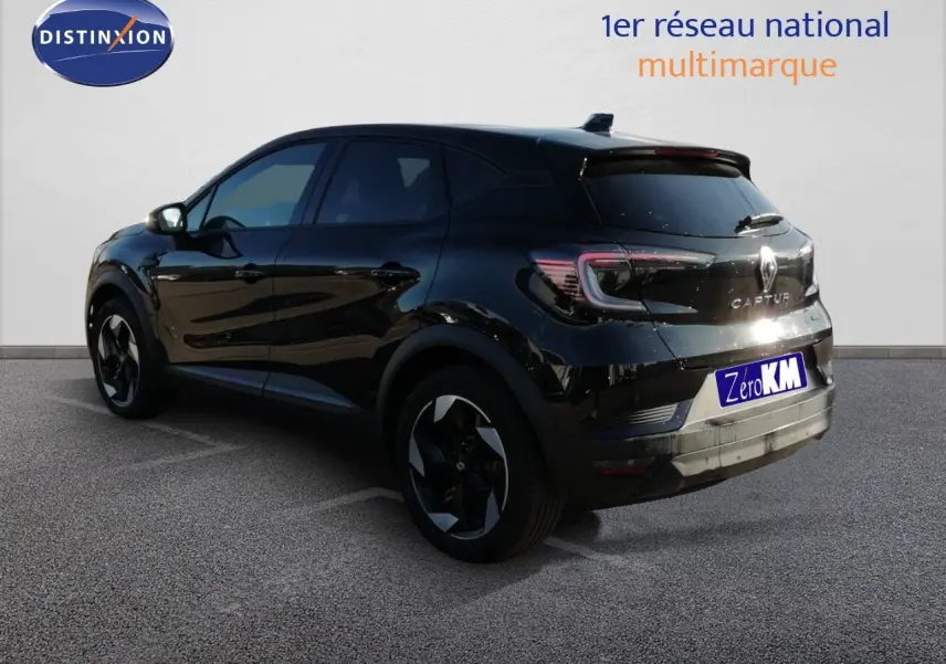 Renault Captur E-Tech hybride noir étoile métal, vue 3/4 arrière droit avec jantes bi-ton et feux LED.