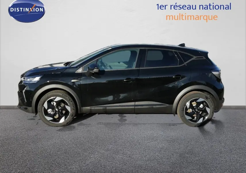 Profil droit du Renault Captur E-Tech Full Hybrid 160ch noir étoile métal, avec jantes biton distinctives et lignes modernes.