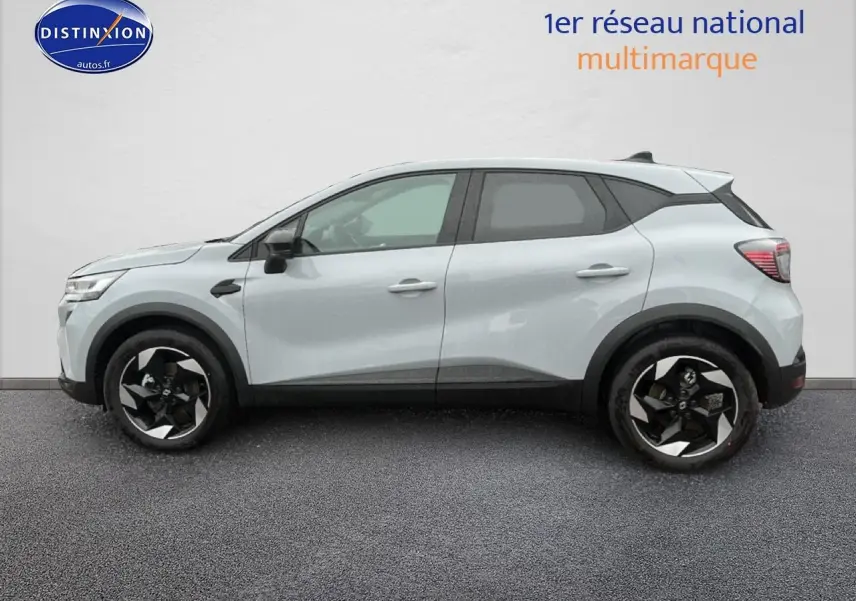 Renault Captur gris rafale vue de profil côté gauche avec jantes alliage et poignées ton carrosserie.