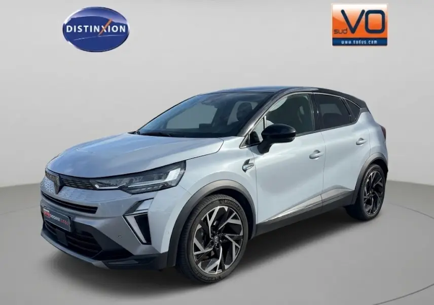 Renault Symbioz gris clair en 3/4 avant droit, avec jantes alliage noires et toit noir contrasté.