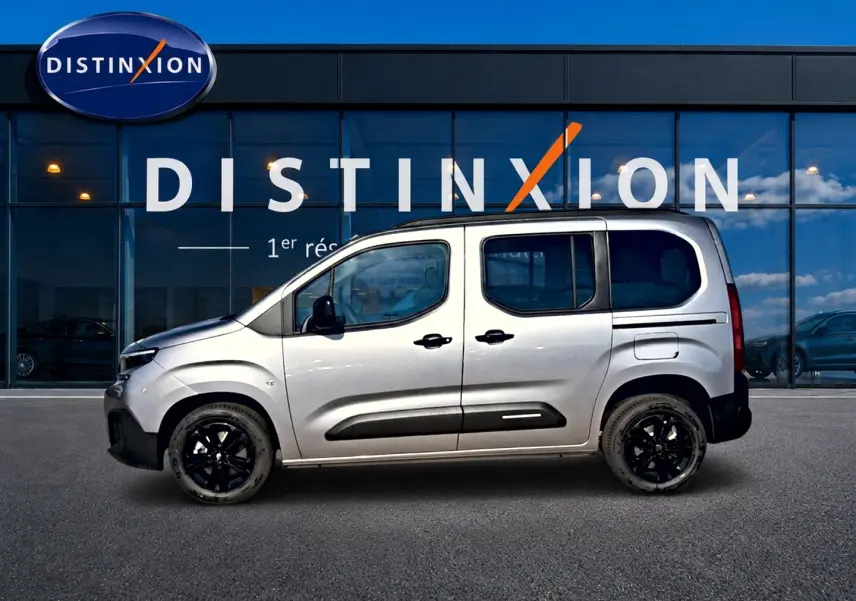 Vue de profil côté gauche du Citroën Berlingo N1 1.5 BlueHDi 130 gris acier avec jantes noires et portes latérales.