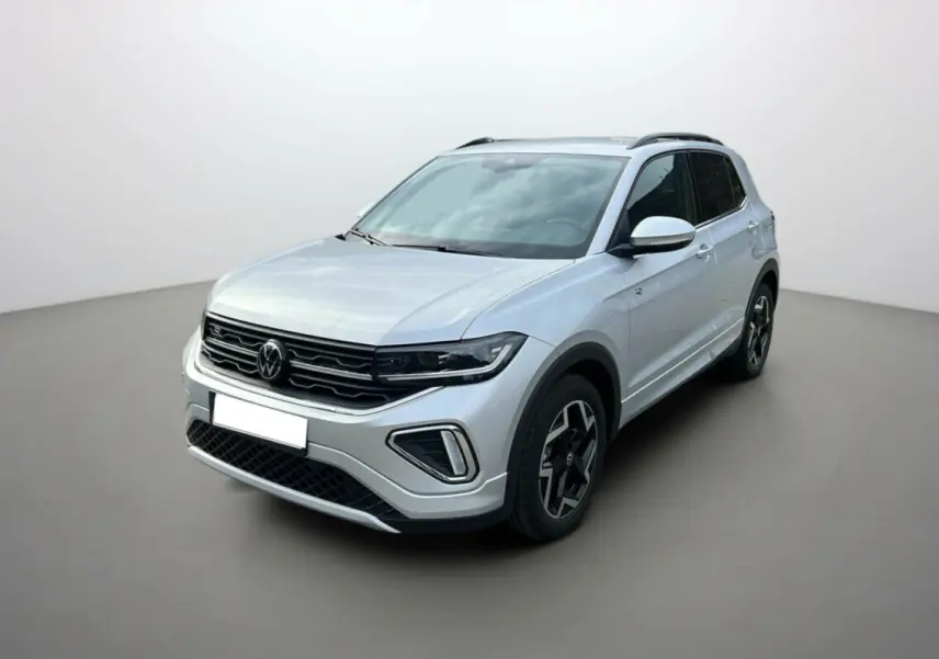 Volkswagen T-Cross TSI 116 DSG7 R-Line gris argent en 3/4 avant droit avec jantes alu 17 pouces et barres de toit.