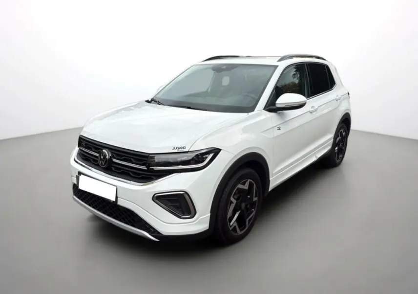 Volkswagen T-Cross TSI 116 DSG7 R-Line blanc pur vu en 3/4 avant avec jantes alu noires et barres de toit.