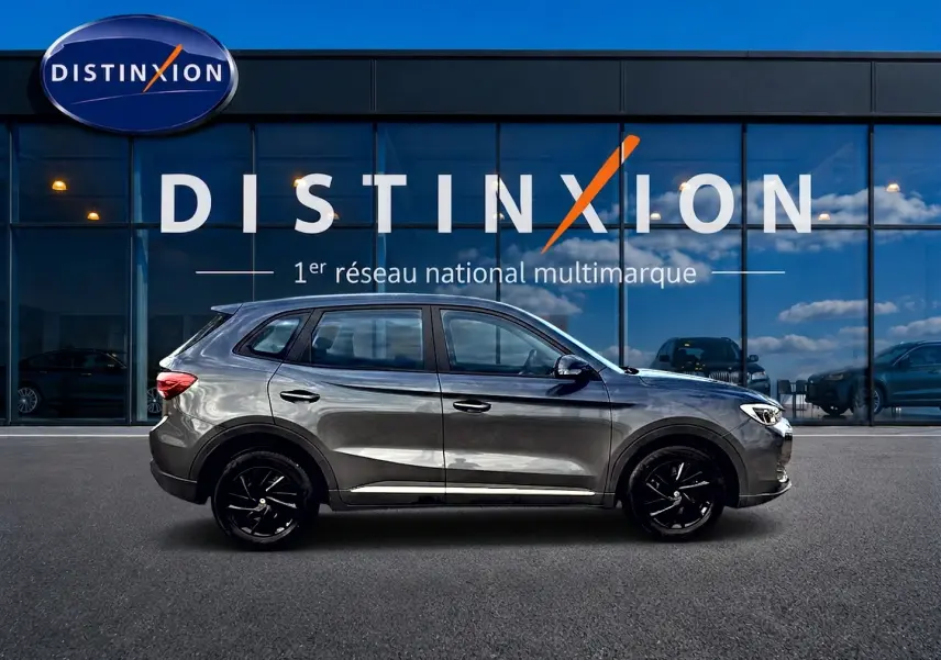 Profil droit du MG ZS 1.5 hybrid Camden grey 2026, avec jantes noires et poignées ton carrosserie.