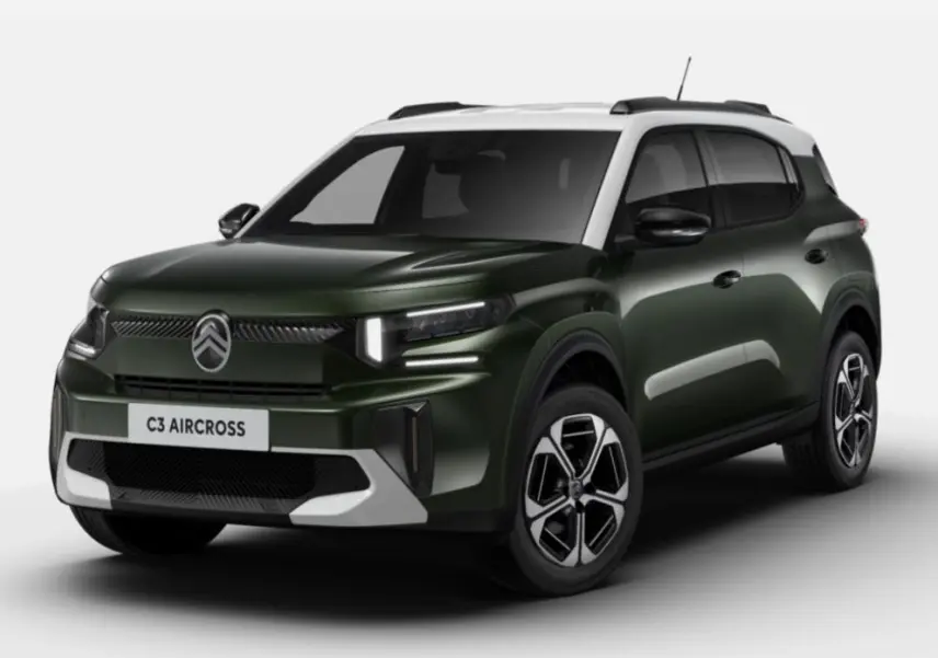 Citroën C3 Aircross hybride 2025 en vert Montana avec toit blanc, vue 3/4 avant droit mettant en valeur ses phares LED et jantes.