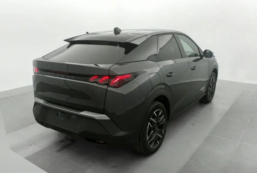 Vue 3/4 arrière droite du Peugeot 3008 Hybrid gris titane avec toit noir et feux arrière LED en forme de griffes.