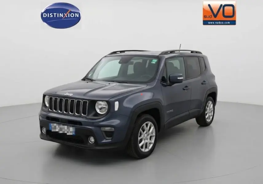 Jeep Renegade bleu en 3/4 avant droit, avec barres de toit et jantes alliage 17 pouces visibles.