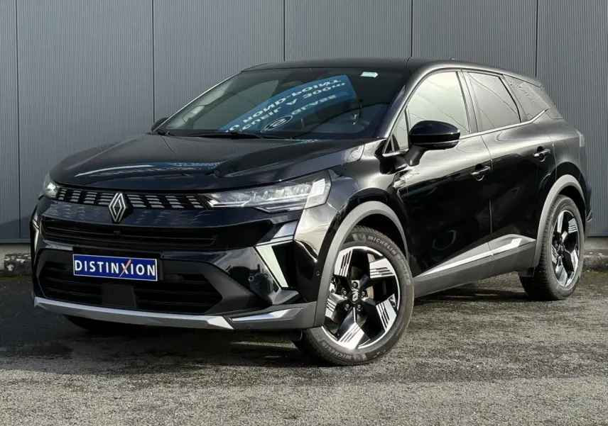 Vue 3/4 avant droit du Renault SYMBIOZ noir étoilé avec jantes 18 pouces et calandre distinctive.