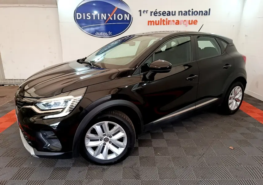 Renault Captur Business Blue dCi 95 noir en 3/4 avant droit, avec jantes alliage et feux LED visibles.