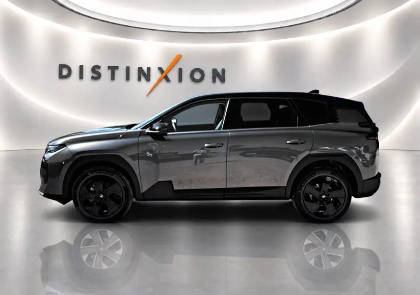 Profil droit du Citroën C5 Aircross 2026 gris platinium avec toit noir et jantes alliage noires.
