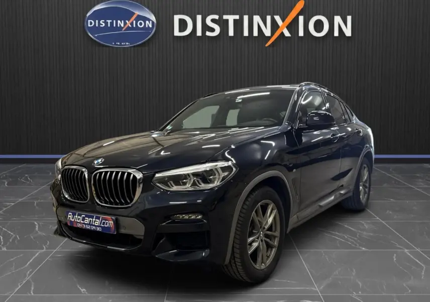BMW X4 XDrive 20d 190 ch M SPORT en Carbonschwarz, vue 3/4 avant avec calandre et phares LED distinctifs.