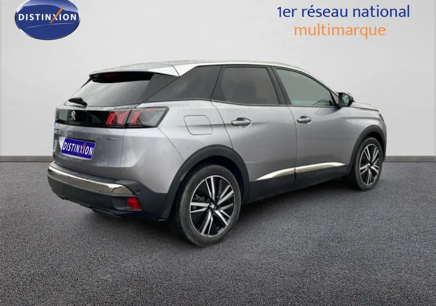 Peugeot 3008 hybride rechargeable gris Artense métal, vue 3/4 arrière côté droit avec jantes alliage bicolores.