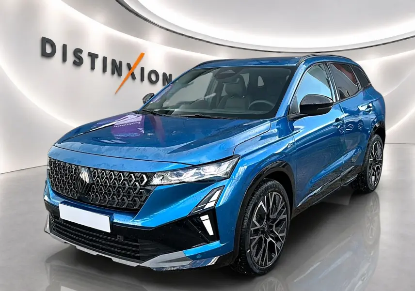 Renault Austral bleu outremer en vue 3/4 avant droit, avec calandre noire et jantes alliage distinctives.