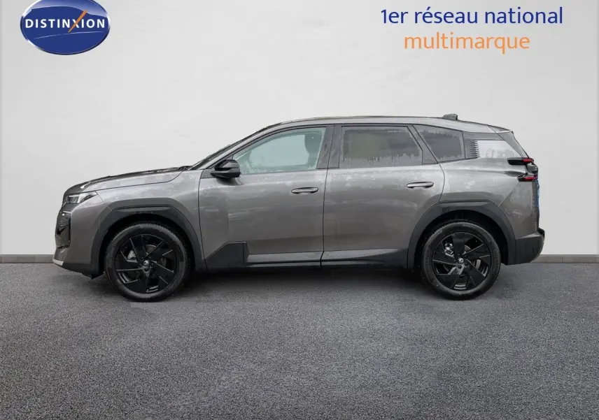 Profil droit d'un Citroën C5 Aircross Hybrid 145ch gris platinium métallisé avec jantes noires et détails noirs contrastants.
