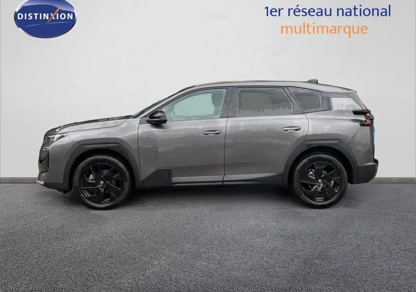 Profil latéral droit du Citroën C5 Aircross Hybrid gris platinium avec jantes noires et détails noirs contrastants.