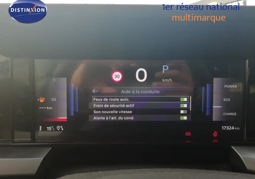 Affichage numérique du tableau de bord d'une Opel Frontera 2025, montrant l'aide à la conduite et la vitesse à 0 km/h.