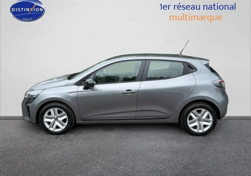 Profil droit d'une Renault Clio V gris schiste 2026 avec jantes alliage et poignées ton carrosserie visibles.