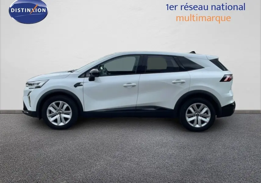 Profil droit d'un Renault Symbioz blanc nacré, SUV hybride 2025 avec jantes alliage et lignes épurées.