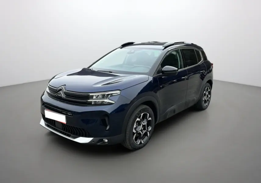 Citroën C5 Aircross Hybrid 145 E-DSC6 Max bleu Eclipse en 3/4 avant droit avec barres de toit et jantes alu 18 pouces.