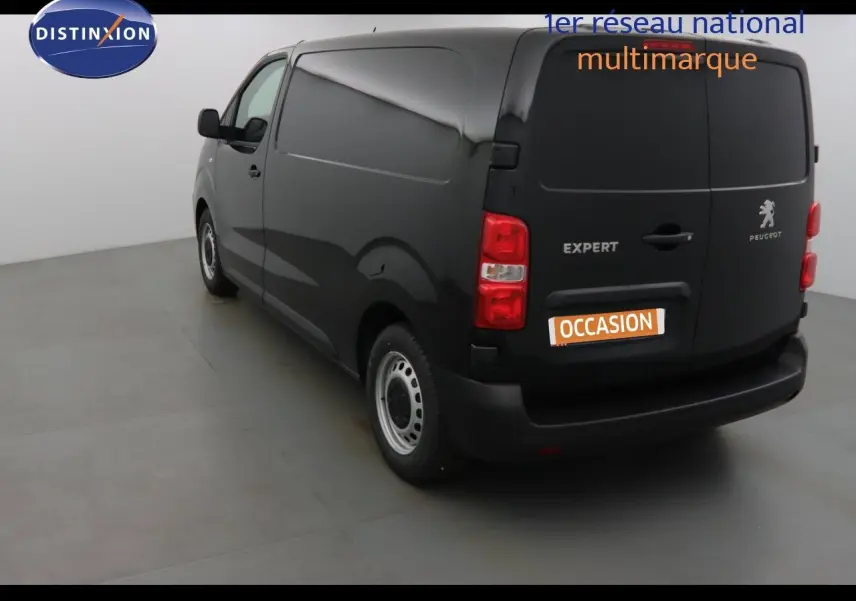 Peugeot Expert Fourgon noir métal vu de profil côté gauche, avec jantes argentées et carrosserie lisse.