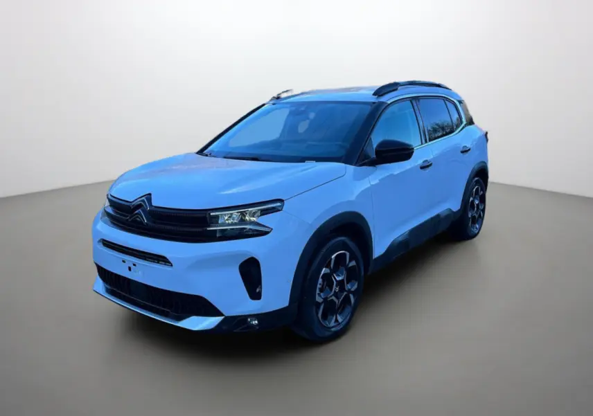 Citroën C5 Aircross Hybrid blanc okénite vue 3/4 avant droit avec barres de toit et jantes alu 18 pouces.