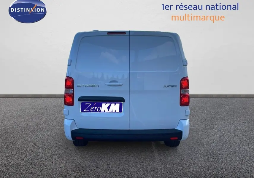 Vue arrière du Citroën Jumpy Fourgon XL blanc Kaolin, avec portes battantes et feux rouges visibles.