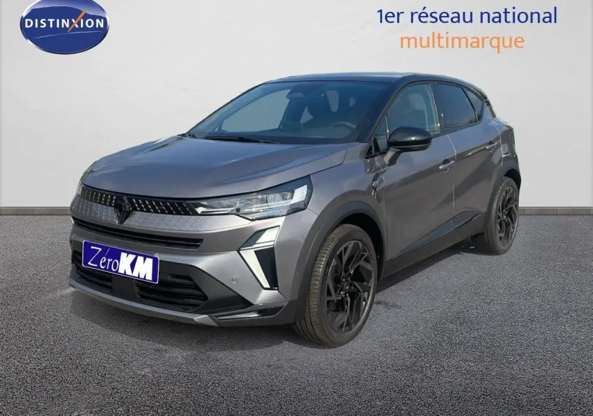 Renault Captur E-Tech hybride gris cassiopée avec toit noir, vue 3/4 avant droit, jantes noires distinctives.