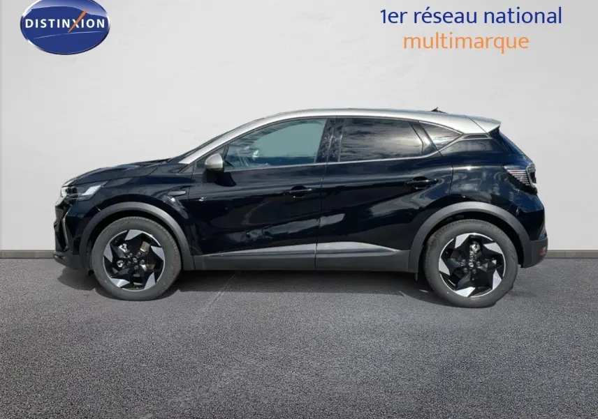 Profil côté gauche du Renault Captur E-Tech hybride 2025 noir étoile avec toit gris et jantes biton.