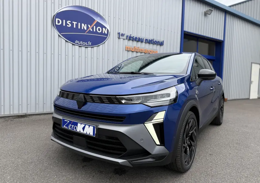 Renault Symbioz bleu iron en 3/4 avant droit, avec calandre noire et jantes noires à design moderne.