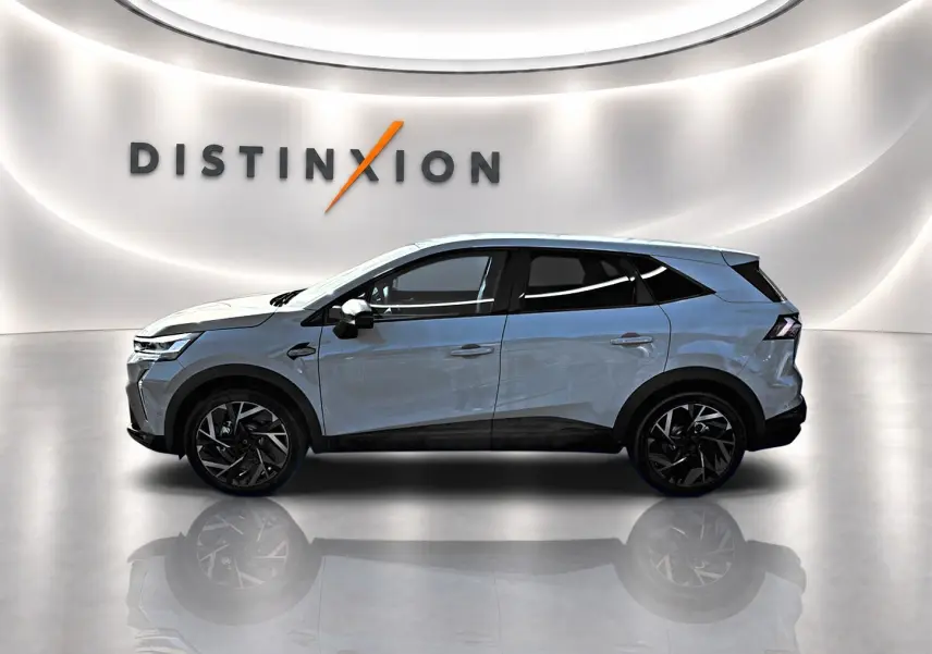 Vue latérale droite du Renault Symbioz gris rafale, avec jantes noires et toit noir contrastant.