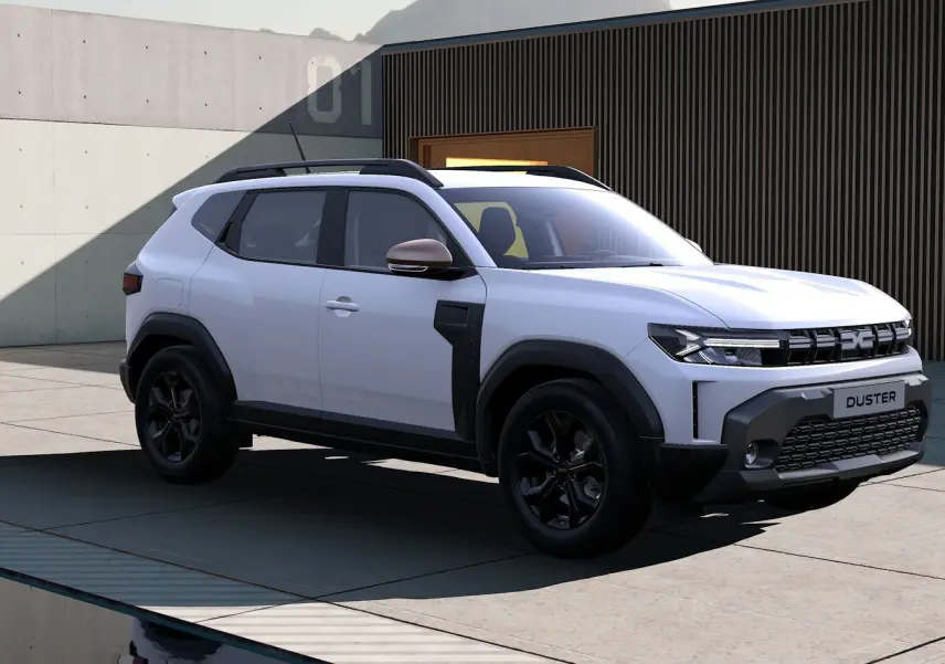 Vue 3/4 avant droite du Dacia Duster Hybrid 155 Extreme blanc glacier avec détails noirs et rétroviseur bronze.