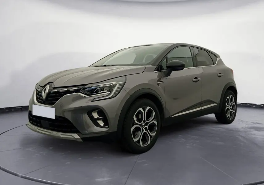 Renault Captur 1.3 Mild Hybrid 140 Techno gris Cassiopée/noir, vue 3/4 avant droit, jantes alliage 18 pouces distinctives.