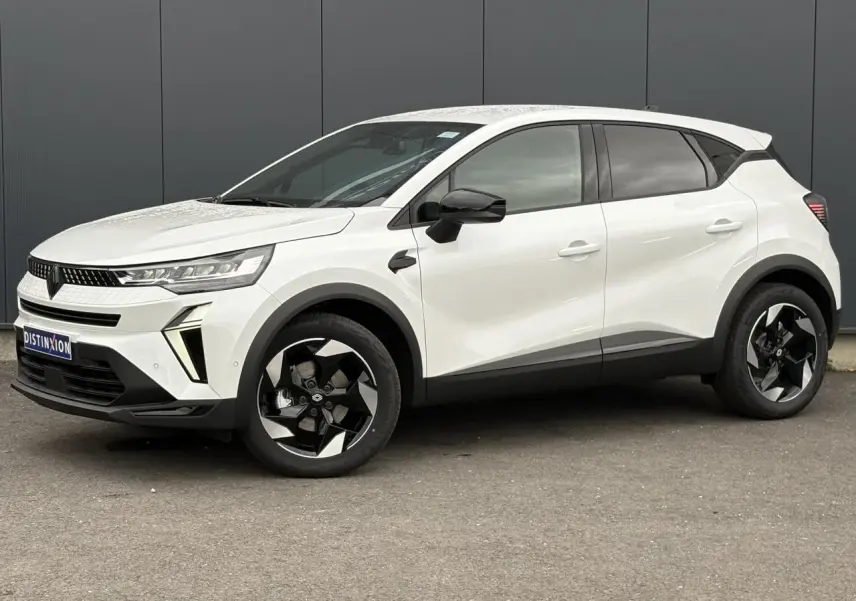 Renault Captur blanc nacré en vue de profil côté gauche, avec jantes noires et détails noirs contrastants.