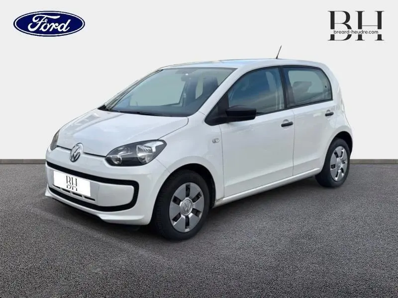 Volkswagen Up blanc Candy vue 3/4 avant droit, compacte avec phares halogènes et jantes acier à enjoliveurs.