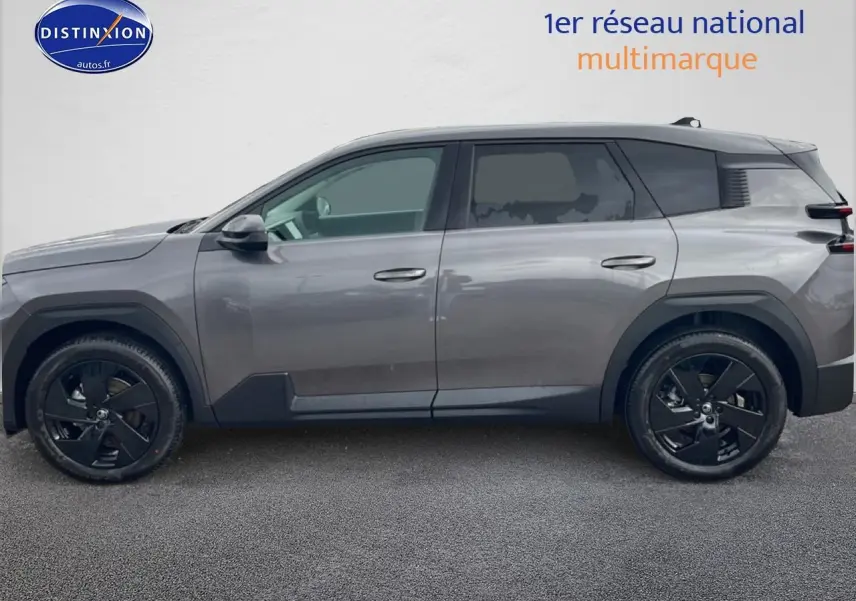 Vue latérale droite du Citroën C5 Aircross gris platinium avec jantes noires et vitres surteintées.